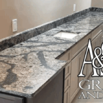 Granite countertop with unique grey and white veining in a kitchen.