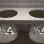 Double sink vanity with a beige granite countertop and undermount sinks.