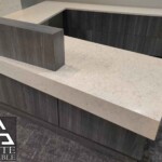 quartz-reception-desk-mitered-waterfall-skirt-side-view